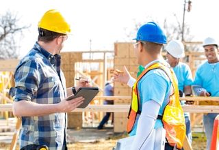 Quality technician conducting low-carbon building material strength verifications